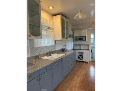 Charming single-story residence in quaint upscale neighborhood on Van Nuys Golf Course in California - for sale on GolfHomes.com, golf home, golf lot