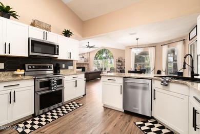 Welcome to this beautifully updated 4-bedroom, 3-bath pool home on The Club At Pelican Bay - North Course in Florida - for sale on GolfHomes.com, golf home, golf lot