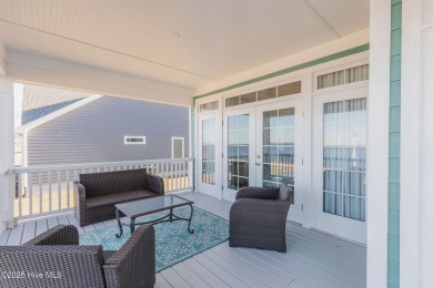 This stunning home sits on the banks of the Albemarle Sound at on Occano Golf Course in North Carolina - for sale on GolfHomes.com, golf home, golf lot