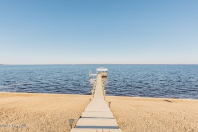 This stunning home sits on the banks of the Albemarle Sound at on Occano Golf Course in North Carolina - for sale on GolfHomes.com, golf home, golf lot