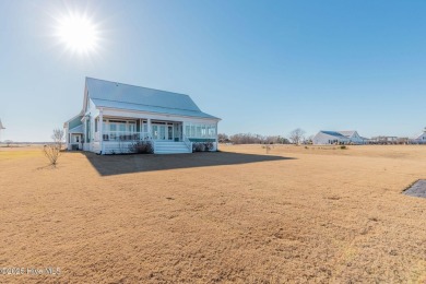 This stunning home sits on the banks of the Albemarle Sound at on Occano Golf Course in North Carolina - for sale on GolfHomes.com, golf home, golf lot