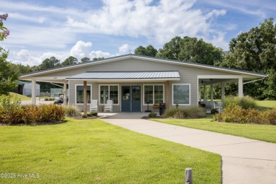 This stunning home sits on the banks of the Albemarle Sound at on Occano Golf Course in North Carolina - for sale on GolfHomes.com, golf home, golf lot