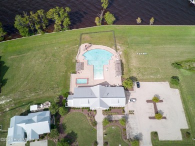 This stunning home sits on the banks of the Albemarle Sound at on Occano Golf Course in North Carolina - for sale on GolfHomes.com, golf home, golf lot