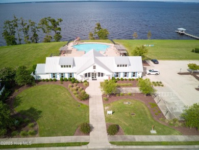 This stunning home sits on the banks of the Albemarle Sound at on Occano Golf Course in North Carolina - for sale on GolfHomes.com, golf home, golf lot