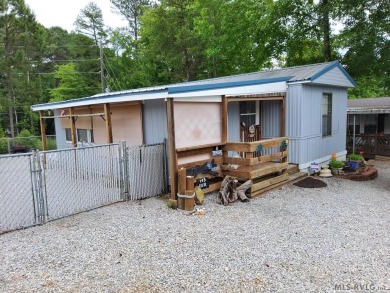 Comfy home in a water front community with lake access. This 2 on River Ridge Golf Club in Virginia - for sale on GolfHomes.com, golf home, golf lot