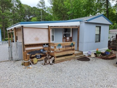 Comfy home in a water front community with lake access. This 2 on River Ridge Golf Club in Virginia - for sale on GolfHomes.com, golf home, golf lot