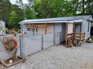 Comfy home in a water front community with lake access. This 2 on River Ridge Golf Club in Virginia - for sale on GolfHomes.com, golf home, golf lot