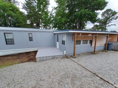 Comfy home in a water front community with lake access. This 2 on River Ridge Golf Club in Virginia - for sale on GolfHomes.com, golf home, golf lot