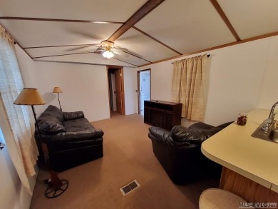 Comfy home in a water front community with lake access. This 2 on River Ridge Golf Club in Virginia - for sale on GolfHomes.com, golf home, golf lot
