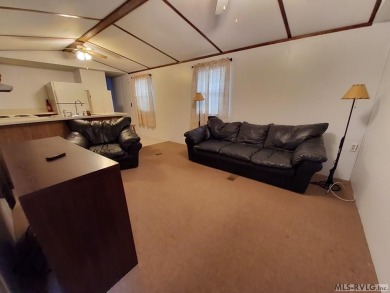 Comfy home in a water front community with lake access. This 2 on River Ridge Golf Club in Virginia - for sale on GolfHomes.com, golf home, golf lot