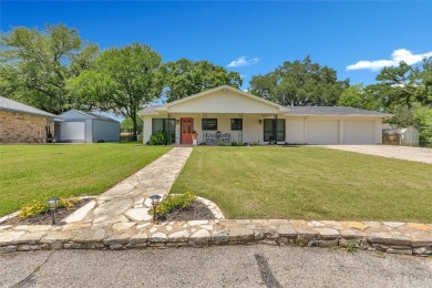 Discover this immaculate, move-in-ready home in the established on De Cordova Bend Country Club in Texas - for sale on GolfHomes.com, golf home, golf lot