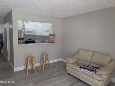 Step out your back door into the refreshing pool. Move in ready on Daytona Beach Golf Club in Florida - for sale on GolfHomes.com, golf home, golf lot