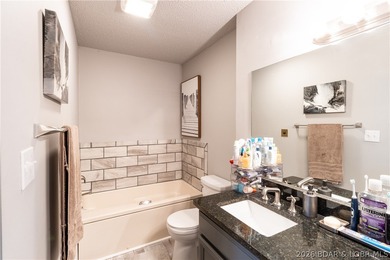 Completely remodeled and ideally located in the heart of Lake of on Seasons Ridge At Four Seasons in Missouri - for sale on GolfHomes.com, golf home, golf lot