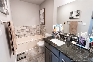 Completely remodeled and ideally located in the heart of Lake of on Seasons Ridge At Four Seasons in Missouri - for sale on GolfHomes.com, golf home, golf lot