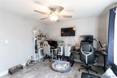 Completely remodeled and ideally located in the heart of Lake of on Seasons Ridge At Four Seasons in Missouri - for sale on GolfHomes.com, golf home, golf lot