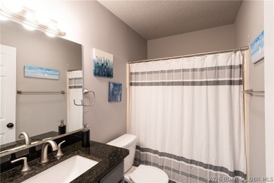 Completely remodeled and ideally located in the heart of Lake of on Seasons Ridge At Four Seasons in Missouri - for sale on GolfHomes.com, golf home, golf lot