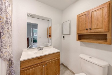 Welcome to this bright and inviting 2 bedroom, 1.5 bath, ground on Cove Cay Country Club in Florida - for sale on GolfHomes.com, golf home, golf lot