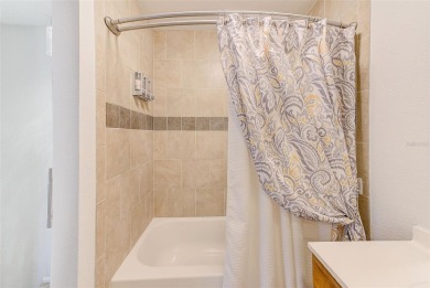 Welcome to this bright and inviting 2 bedroom, 1.5 bath, ground on Cove Cay Country Club in Florida - for sale on GolfHomes.com, golf home, golf lot