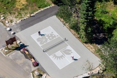This inviting .46 acre homesite is poised gracefully between the on Osprey Meadows at Tamarack Resort in Idaho - for sale on GolfHomes.com, golf home, golf lot