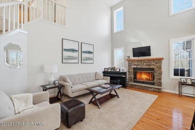 Contemporary elegance meets mountain serenity in the prestigious on Pinecrest Lake Golf and Country Club in Pennsylvania - for sale on GolfHomes.com, golf home, golf lot