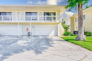 Welcome to this bright and inviting 2 bedroom, 1.5 bath, ground on Cove Cay Country Club in Florida - for sale on GolfHomes.com, golf home, golf lot