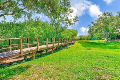 Welcome to this bright and inviting 2 bedroom, 1.5 bath, ground on Cove Cay Country Club in Florida - for sale on GolfHomes.com, golf home, golf lot