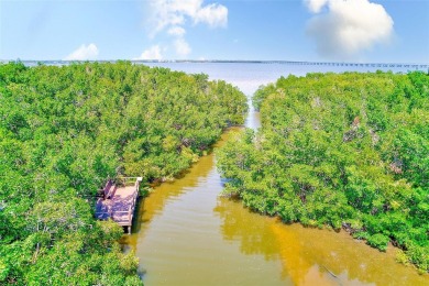 Welcome to this bright and inviting 2 bedroom, 1.5 bath, ground on Cove Cay Country Club in Florida - for sale on GolfHomes.com, golf home, golf lot