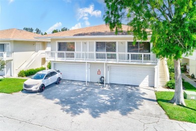 Welcome to this bright and inviting 2 bedroom, 1.5 bath, ground on Cove Cay Country Club in Florida - for sale on GolfHomes.com, golf home, golf lot