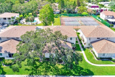 Welcome to this bright and inviting 2 bedroom, 1.5 bath, ground on Cove Cay Country Club in Florida - for sale on GolfHomes.com, golf home, golf lot