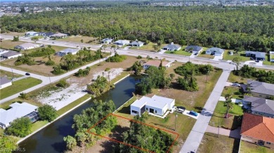 Discover waterfront bliss at 1908 NW 28th PL in Cape Coral, FL! on Coral Oaks Golf Course in Florida - for sale on GolfHomes.com, golf home, golf lot