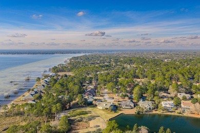 Located in Bluewater Bay's popular Southwind neighborhood, this on Golf Club at Bluewater Bay Resort in Florida - for sale on GolfHomes.com, golf home, golf lot