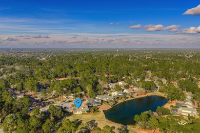 Located in Bluewater Bay's popular Southwind neighborhood, this on Golf Club at Bluewater Bay Resort in Florida - for sale on GolfHomes.com, golf home, golf lot