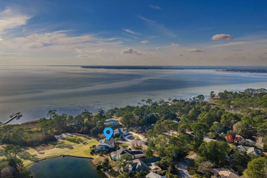 Located in Bluewater Bay's popular Southwind neighborhood, this on Golf Club at Bluewater Bay Resort in Florida - for sale on GolfHomes.com, golf home, golf lot