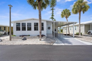 Welcome to this sweet, little abode.  This home has been on Pelican Pointe Golf and Country Club in Florida - for sale on GolfHomes.com, golf home, golf lot