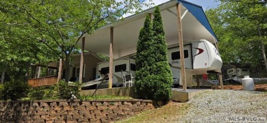 Beautifully maintained 2007 Forest River Cardinal 34' Fifth on River Ridge Golf Club in Virginia - for sale on GolfHomes.com, golf home, golf lot