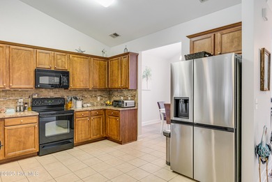 Motivated seller offering a great buy for this 3 bedroom, 2 bath on Long Bay Club in South Carolina - for sale on GolfHomes.com, golf home, golf lot