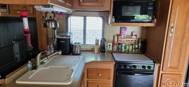 Beautifully maintained 2007 Forest River Cardinal 34' Fifth on River Ridge Golf Club in Virginia - for sale on GolfHomes.com, golf home, golf lot