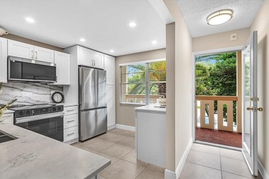 Experience unparalleled luxury in this stunning, remodeled 2 bed on Wynmoor Golf Course in Florida - for sale on GolfHomes.com, golf home, golf lot