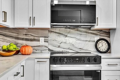 Experience unparalleled luxury in this reduced price *stunning* on Wynmoor Golf Course in Florida - for sale on GolfHomes.com, golf home, golf lot