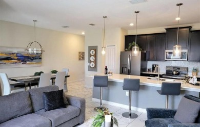 Welcome to this stunning Townhouse especially designed as a on ChampionsGate Golf Resort in Florida - for sale on GolfHomes.com, golf home, golf lot