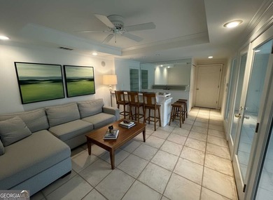 Step into luxury with this beautifully maintained two-story on Towne Lake Hills Golf Club in Georgia - for sale on GolfHomes.com, golf home, golf lot