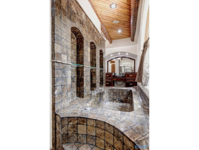 Experience true luxury where privacy, recreation, convenience on The Shoals Golf Club in Alabama - for sale on GolfHomes.com, golf home, golf lot