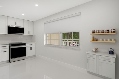 Welcome to this stunning fully renovated 3-bedroom, 2.5-bath on Palm-Aire Country Club and Resort - The Oaks in Florida - for sale on GolfHomes.com, golf home, golf lot