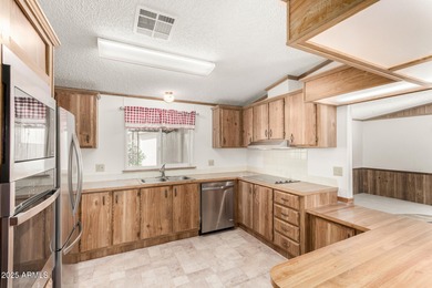 Enjoy easy, low-maintenance living in this move-in ready on Sun Lakes Country Club in Arizona - for sale on GolfHomes.com, golf home, golf lot