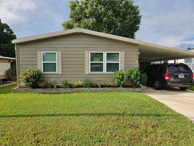 YOUR FLORIDA DREAM HOME is move-in ready! This METICULOUSLY on Grasslands Golf and Country Club in Florida - for sale on GolfHomes.com, golf home, golf lot