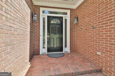 Enjoy the golf course views from this beautifully updated 4bd/3 on Canongate On White Oak Golf Course in Georgia - for sale on GolfHomes.com, golf home, golf lot