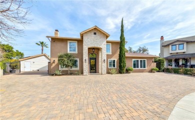 A paved driveway and elegant entrance welcome you to this on Newport Beach Golf Course in California - for sale on GolfHomes.com, golf home, golf lot