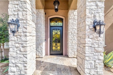 A paved driveway and elegant entrance welcome you to this on Newport Beach Golf Course in California - for sale on GolfHomes.com, golf home, golf lot