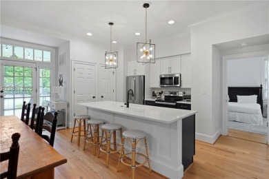 Coastal-chic golf cottage in the private, gated golf community on Berkeley Hall Golf Club in South Carolina - for sale on GolfHomes.com, golf home, golf lot