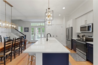Coastal-chic golf cottage in the private, gated golf community on Berkeley Hall Golf Club in South Carolina - for sale on GolfHomes.com, golf home, golf lot